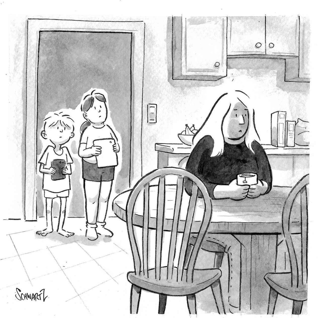 Two kids stand in the doorway of a kitchen holding tablets. A mom sits at a table facing away from them holding a cup of...
